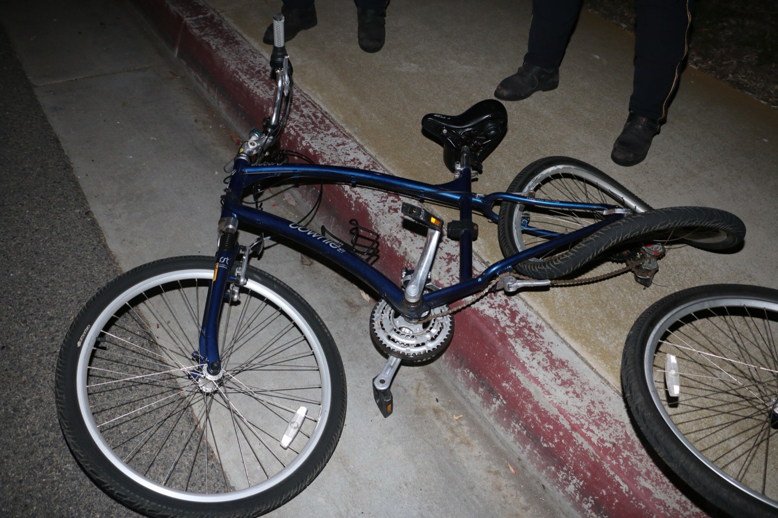Boyd Johnson’s bicycle on the kerb after the collision, frame bent and a wheel torn off